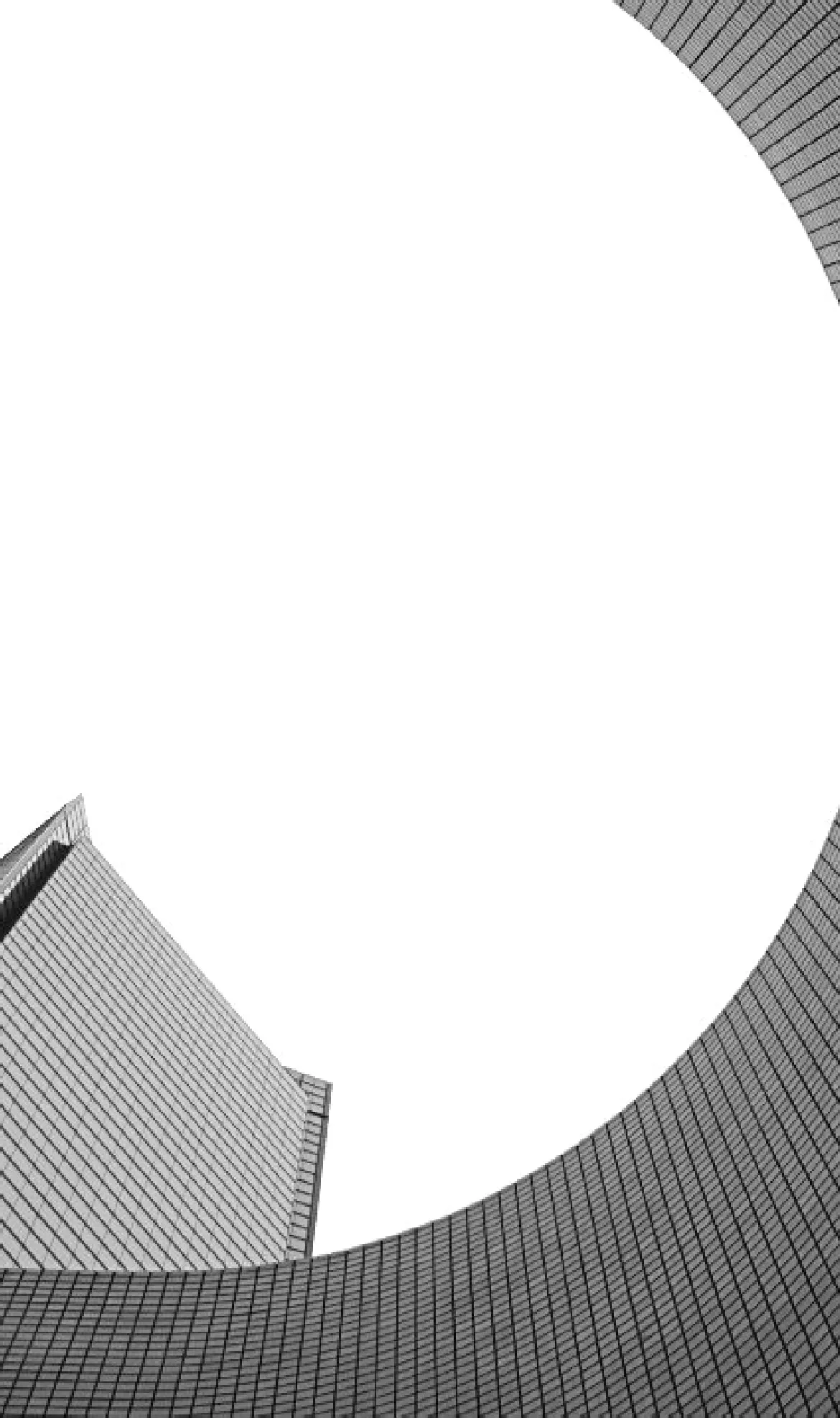 Pale curved facades seen from ground level